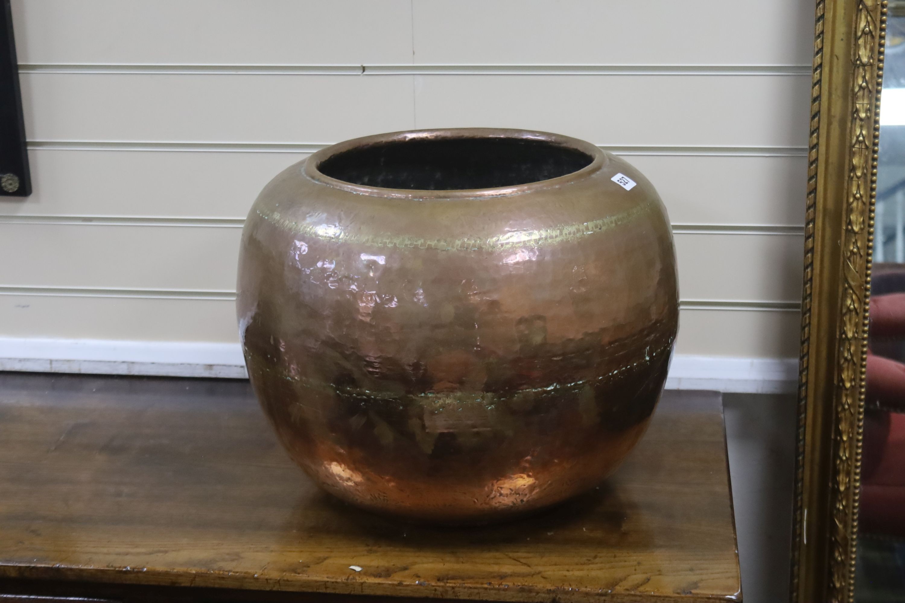 A large planished copper jardiniere 36cm